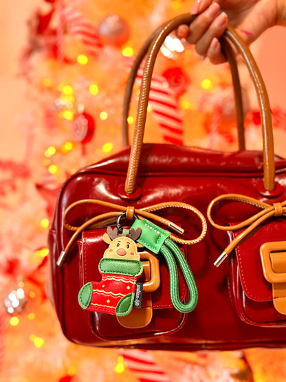 Rudolf Charm – Un toque de brillo que guía tu estilo